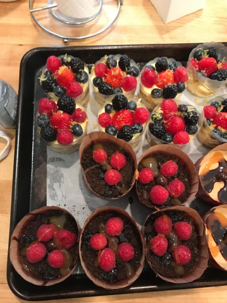 A tray of berry tartlets